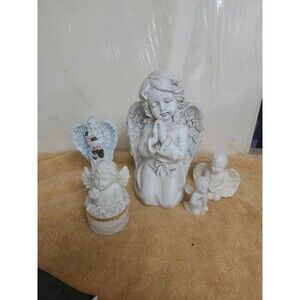 5 angel figurines